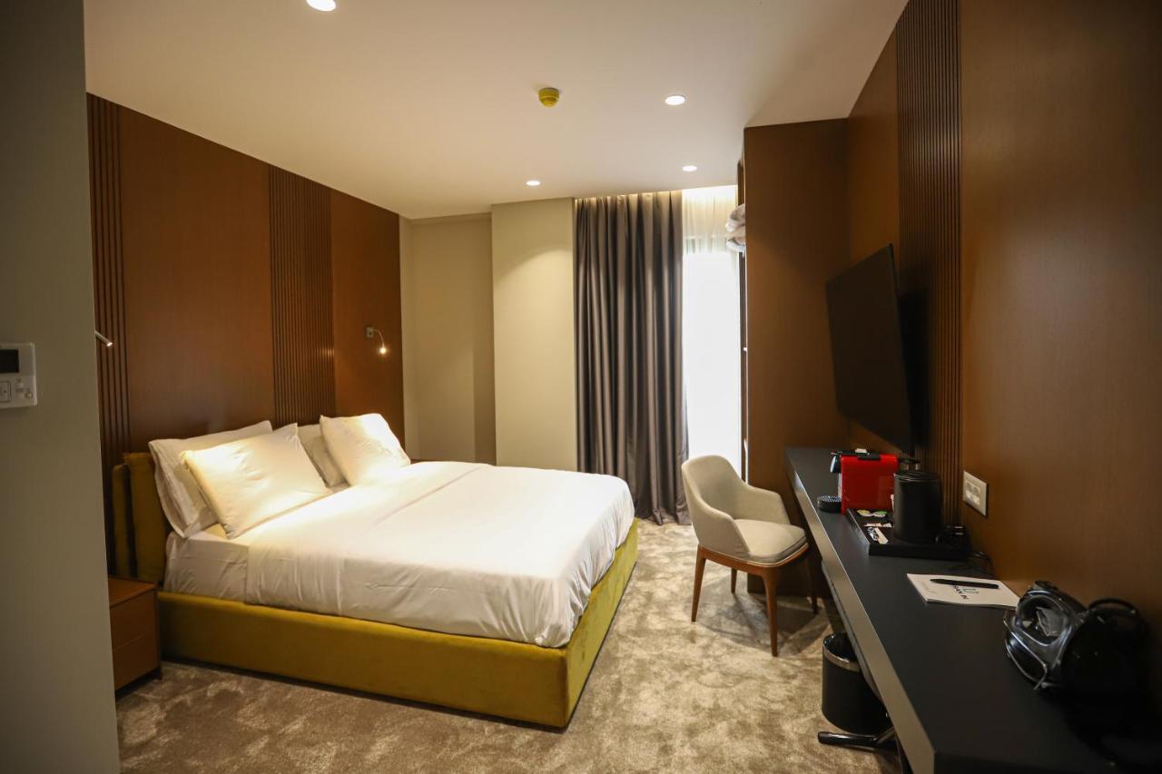 Urbanin Apartment & Hotel Тирана Экстерьер фото