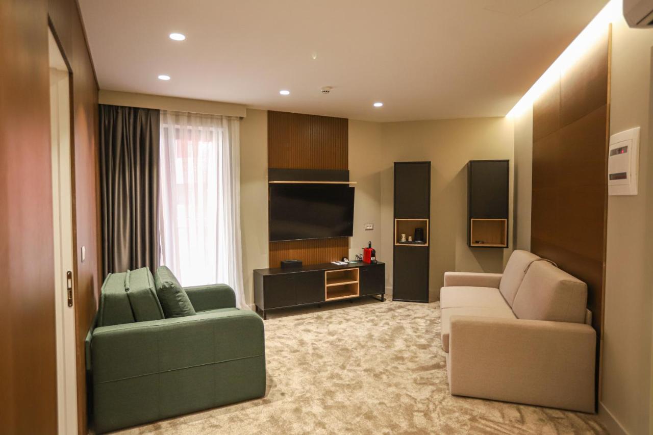 Urbanin Apartment & Hotel Тирана Экстерьер фото