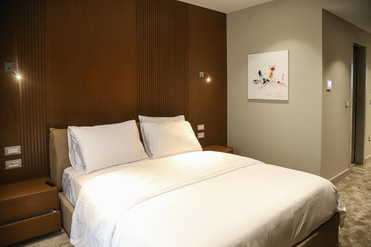Urbanin Apartment & Hotel Тирана Экстерьер фото